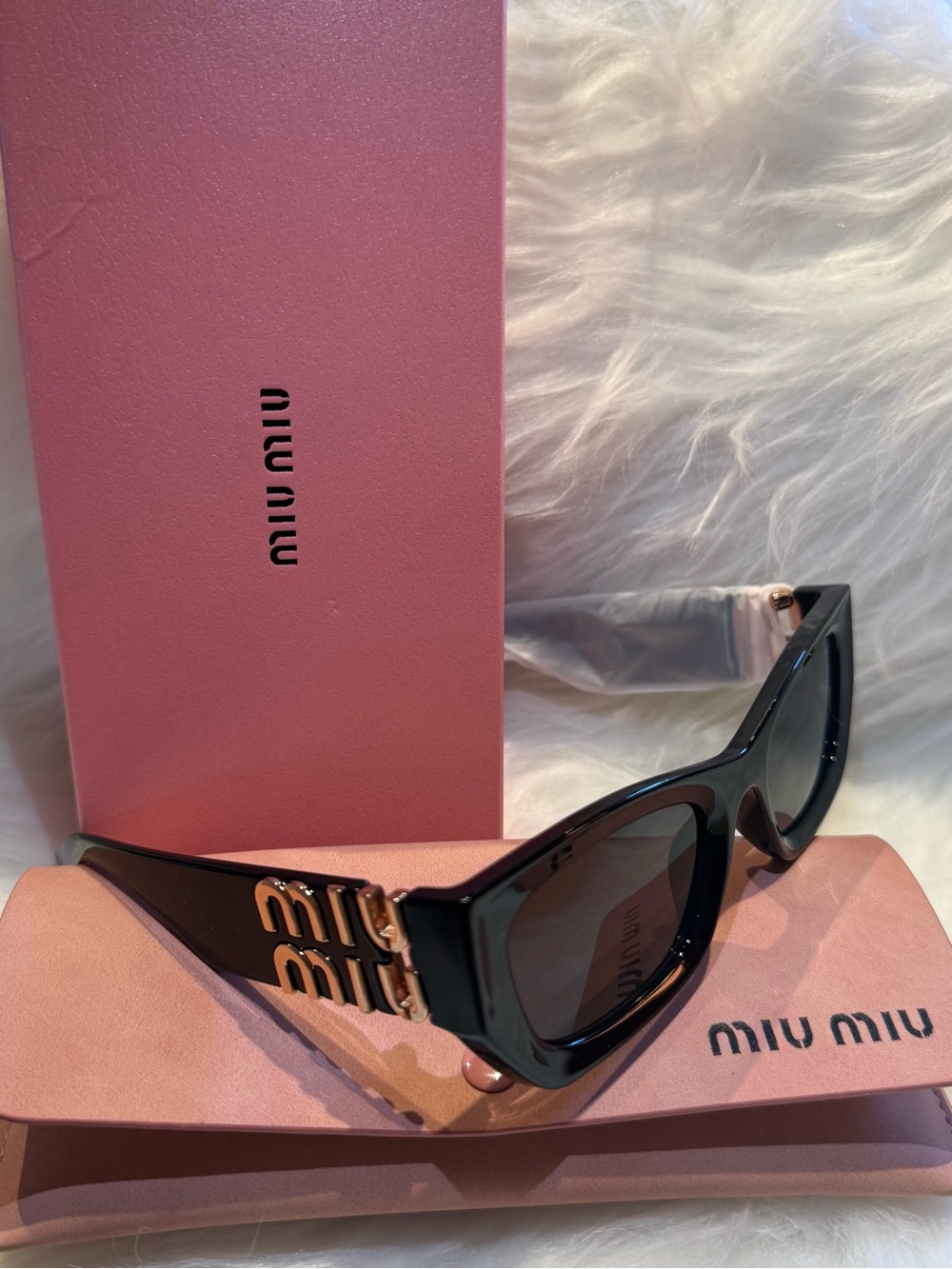 Miu Miu Black Sunglasses with Gold Temple Logo